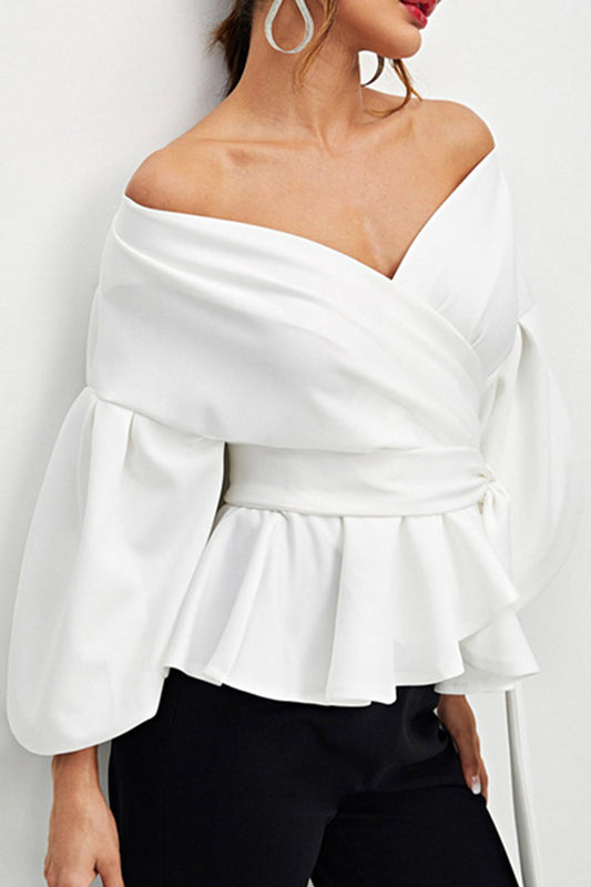 Elegante blusa lisa con escote en V y lazo