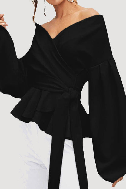 Elegante blusa lisa con escote en V y lazo