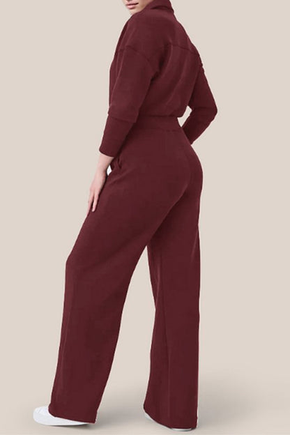 Mono informal sencillo con cuello vuelto, bolsillos sólidos y cremallera