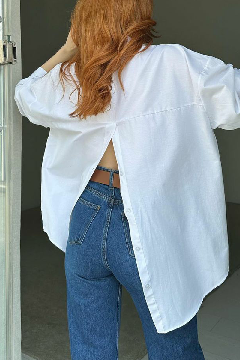 Tops de cuello vuelto con abertura y botones lisos de calle