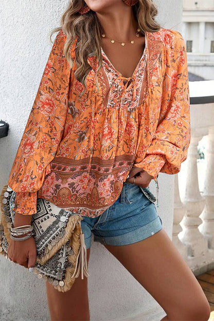Elegantes blusas con cuello en V y estampado floral