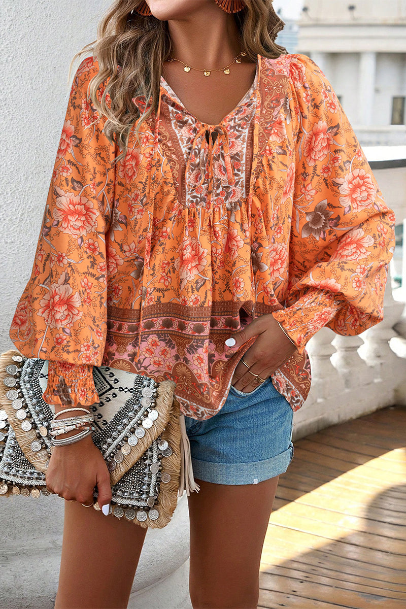 Elegantes blusas con cuello en V y estampado floral