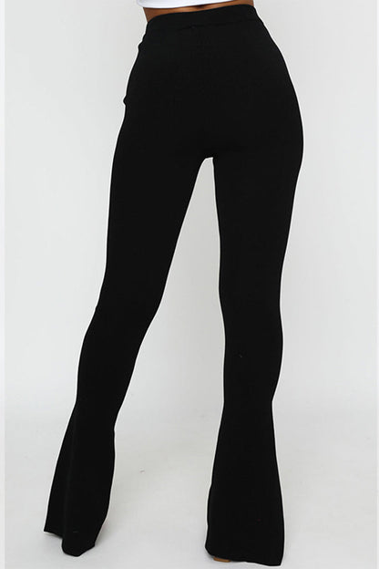 Pantalones de color liso con cintura alta, ajustados y con aberturas simples