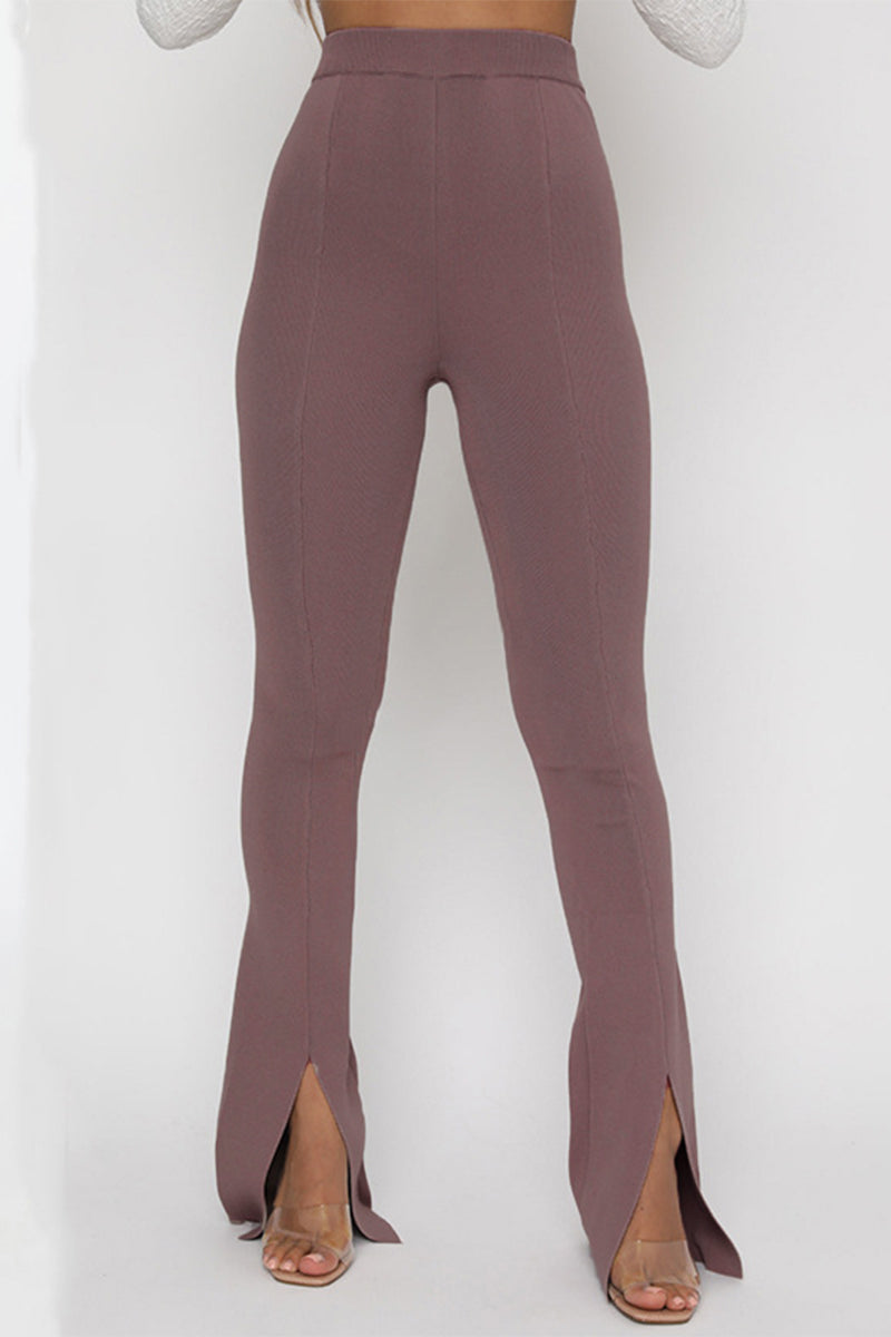 Pantalones de color liso con cintura alta, ajustados y con aberturas simples