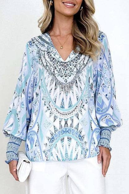 Blusas elegantes con cuello en V y estampados