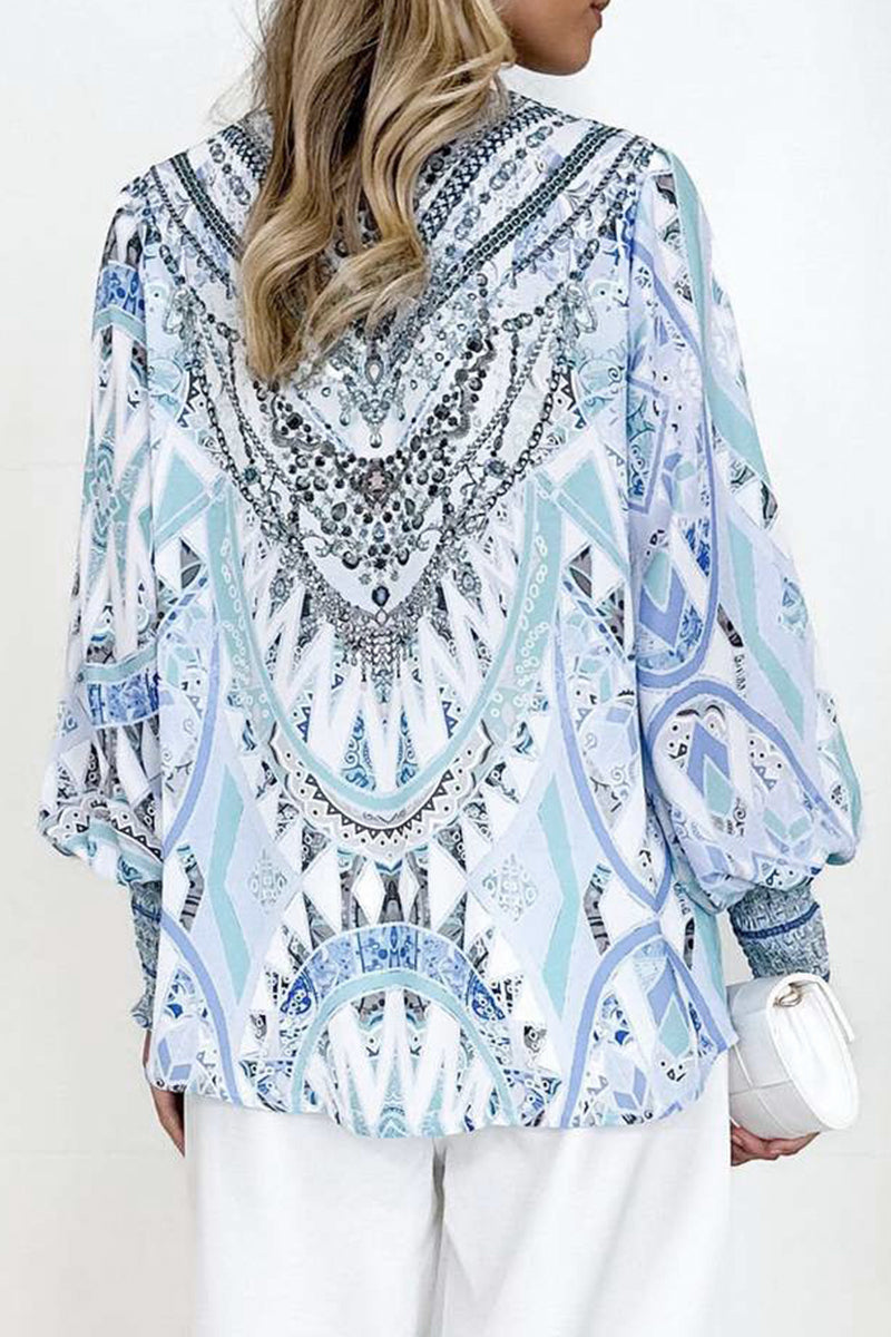 Blusas elegantes con cuello en V y estampados