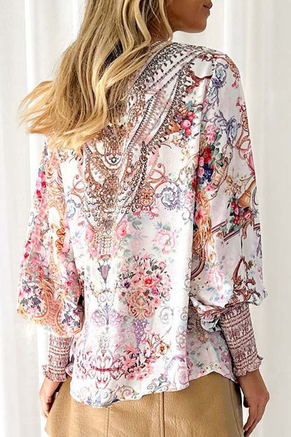Blusas elegantes con cuello en V y estampados