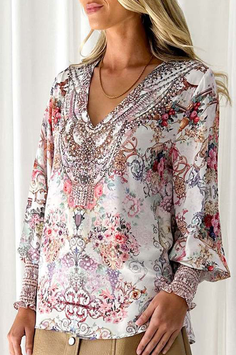 Blusas elegantes con cuello en V y estampados