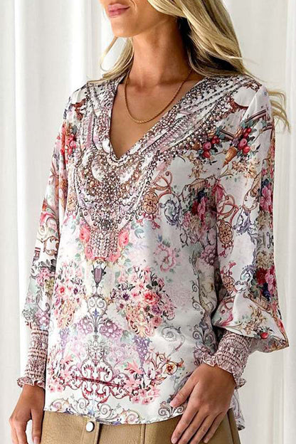 Blusas elegantes con cuello en V y estampados