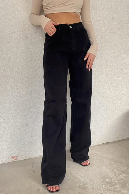 Vaqueros de mezclilla de cintura media con bolsillos lisos y sencillos de estilo casual