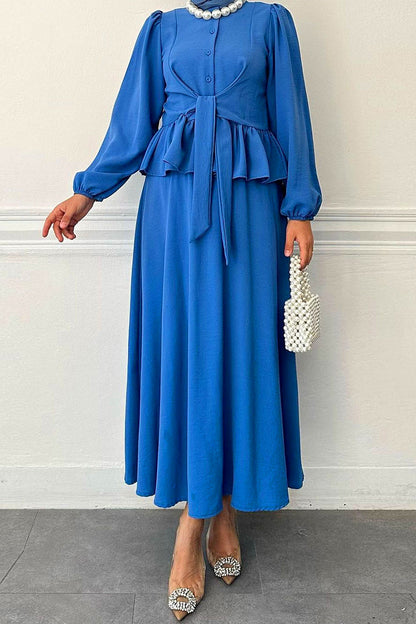 Elegante conjunto de dos piezas de manga larga con cuello redondo y volante de frenillo liso