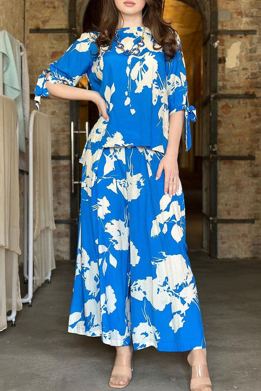 Conjunto de dos piezas vintage elegante con frenillo floral, cuello redondo y media manga