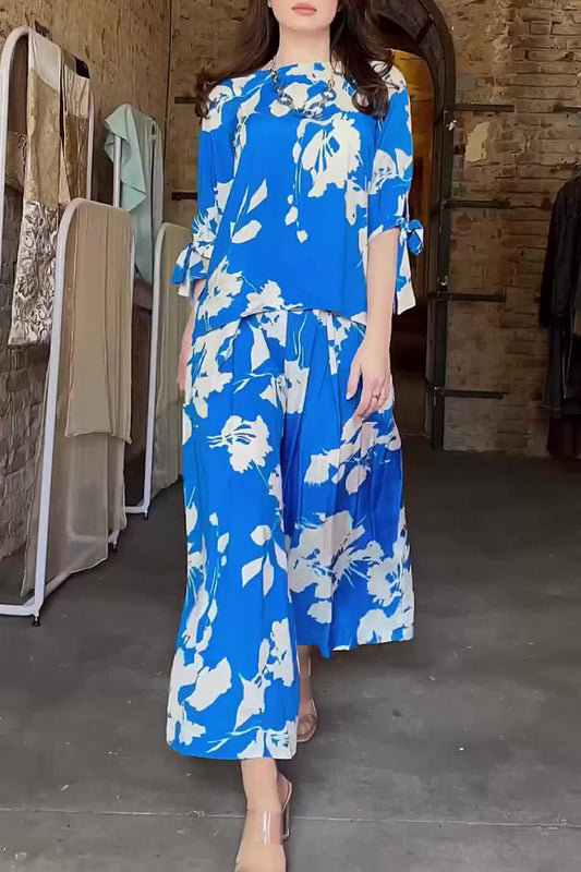 Conjunto de dos piezas vintage elegante con frenillo floral, cuello redondo y media manga