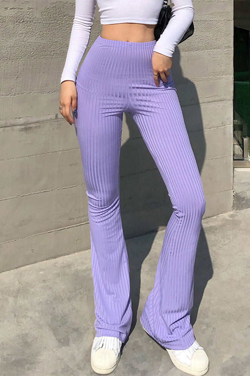 Pantalones casuales sencillos de color liso con cintura alta y botones.