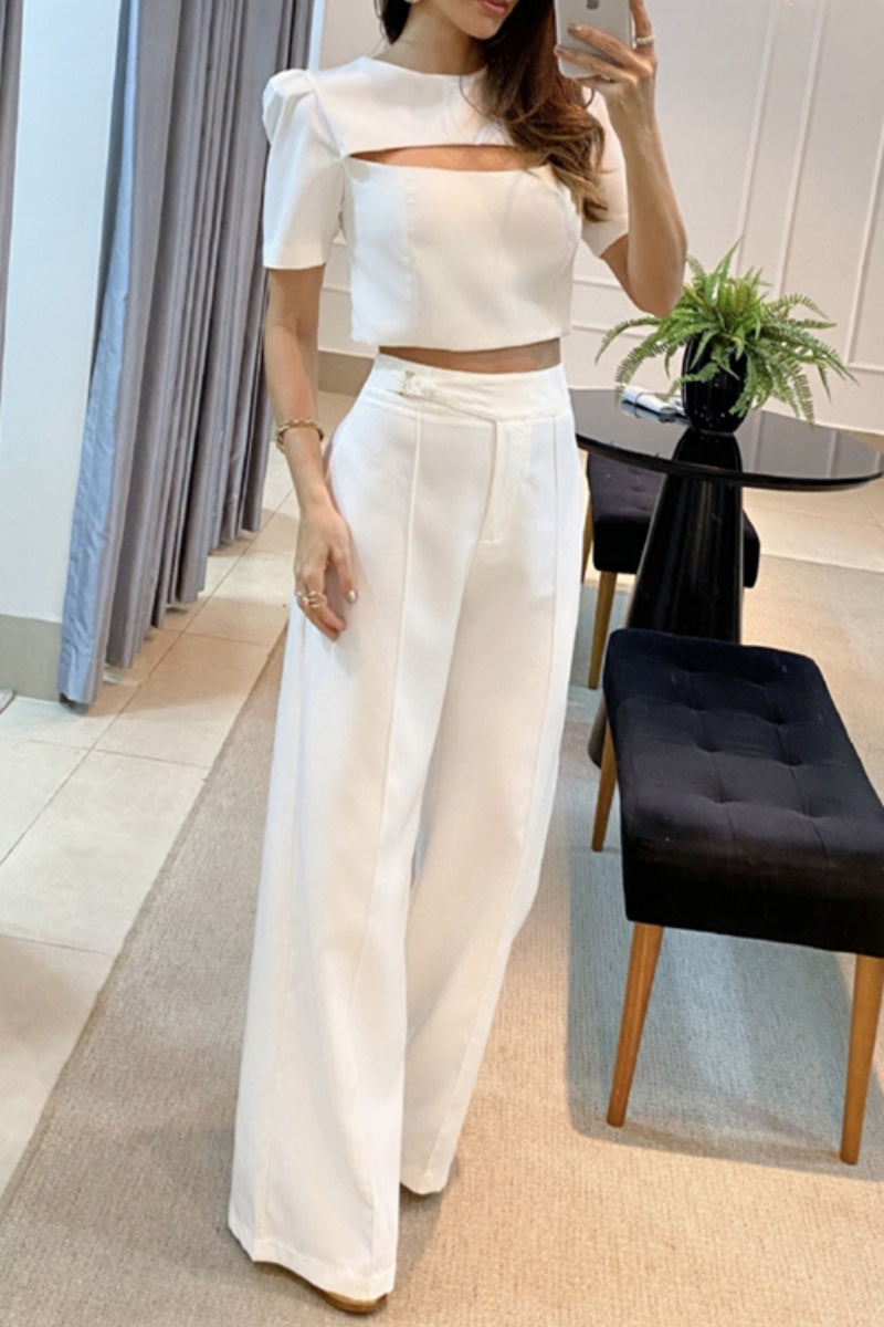 Conjunto informal de dos piezas con cuello redondo, manga corta y aberturas lisas