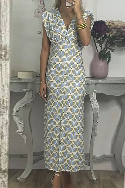 Vestidos elegantes de celebridades con estampado geométrico en contraste, escote en V y falda de un solo paso