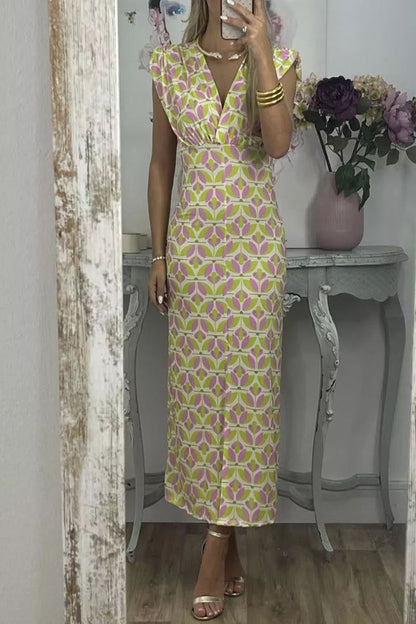 Vestidos elegantes de celebridades con estampado geométrico en contraste, escote en V y falda de un solo paso