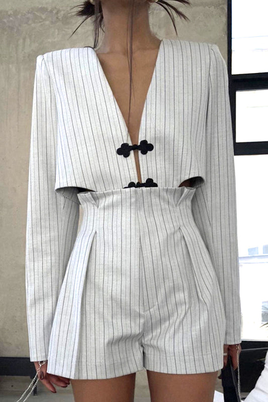 Conjunto informal de dos piezas con cuello en V asimétrico, manga larga y botones a rayas de estilo británico