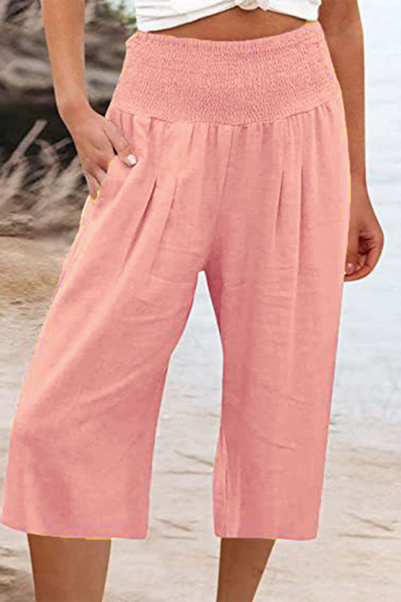 Pantalones casuales sencillos de color liso con bolsillos, sueltos, de cintura alta y pierna ancha.