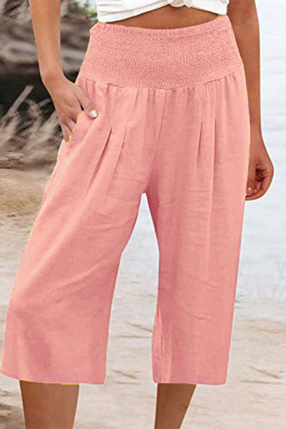 Pantalones casuales sencillos de color liso con bolsillos, sueltos, de cintura alta y pierna ancha.