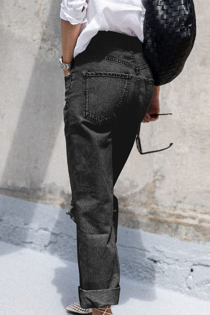 Pantalones vaqueros holgados con rotos y ropa deportiva informal