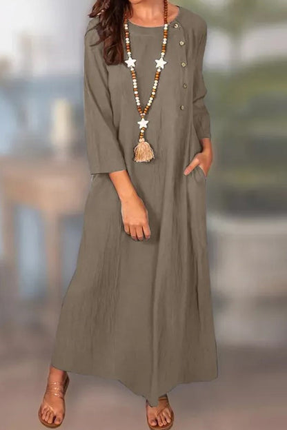 Vestidos casuales de manga larga con cuello redondo, bolsillos y botones sólidos