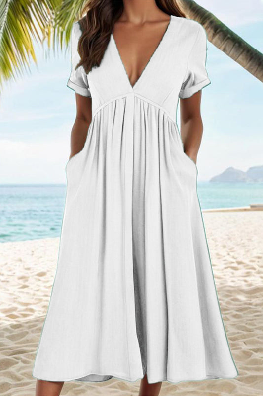Vestidos casuales de corte A con cuello en V, bolsillos y pliegues sólidos