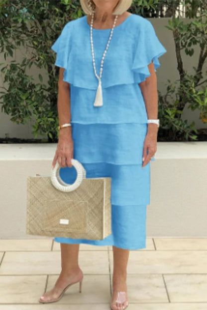 Vestidos elegantes y dulces con falda pastel, cuello redondo y volantes lisos