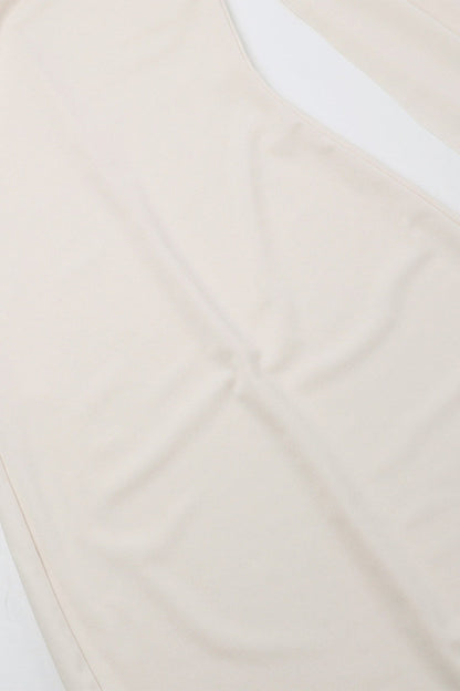 Elegante vestido de falda de un solo paso con cuello oblicuo y patchwork sólido