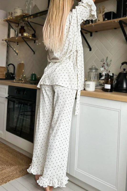 Conjunto de tres piezas sin mangas con cuello en U y volantes con estampado de amor de Casual Living