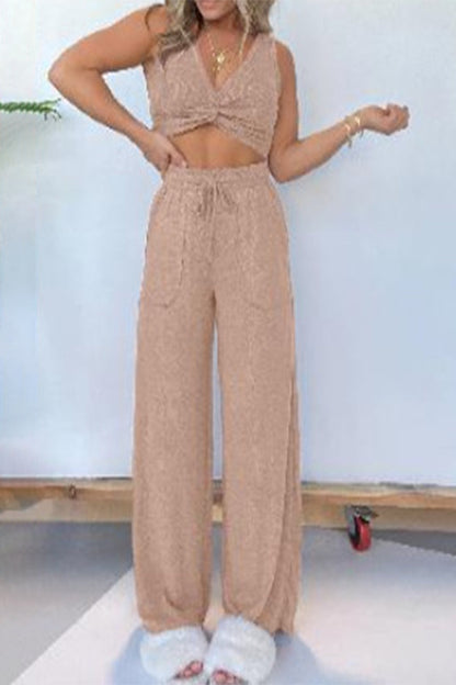Conjunto de dos piezas sexy informal de color liso con bolsillos y escote en V sin mangas
