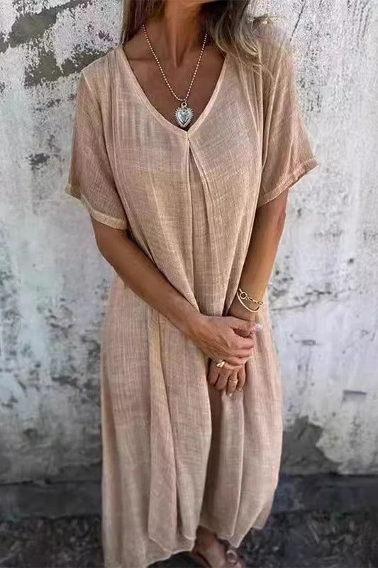 Vestido informal liso con cuello en V y manga corta.