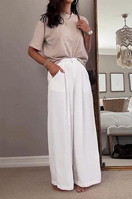 Conjunto informal de dos piezas con cuello redondo, manga corta y bolsillos sólidos