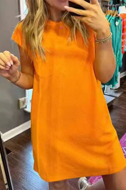 Vestido informal sencillo de manga corta con cuello redondo y bolsillos lisos