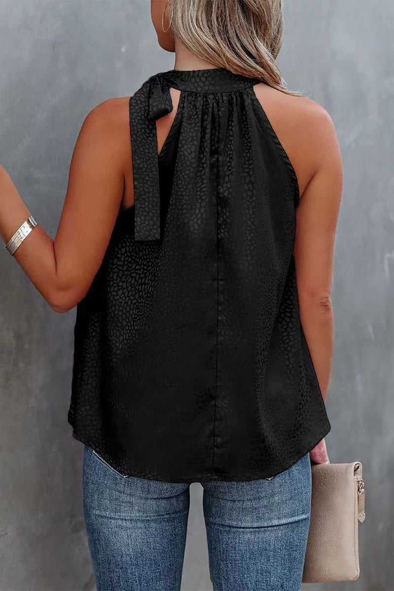 Tops halter de leopardo con lazo