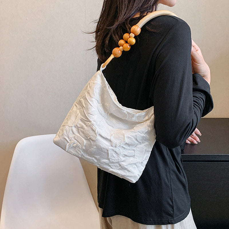 Bolsos vintage elegantes con flores y cuentas plegables