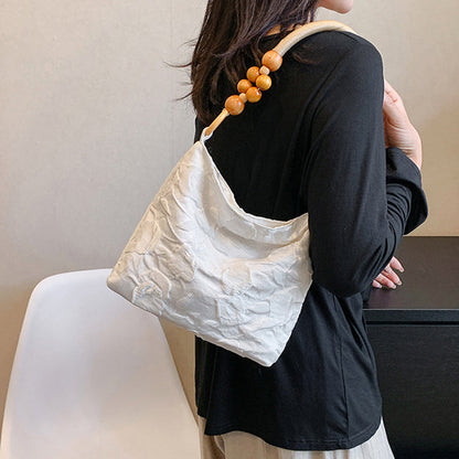 Bolsos vintage elegantes con flores y cuentas plegables