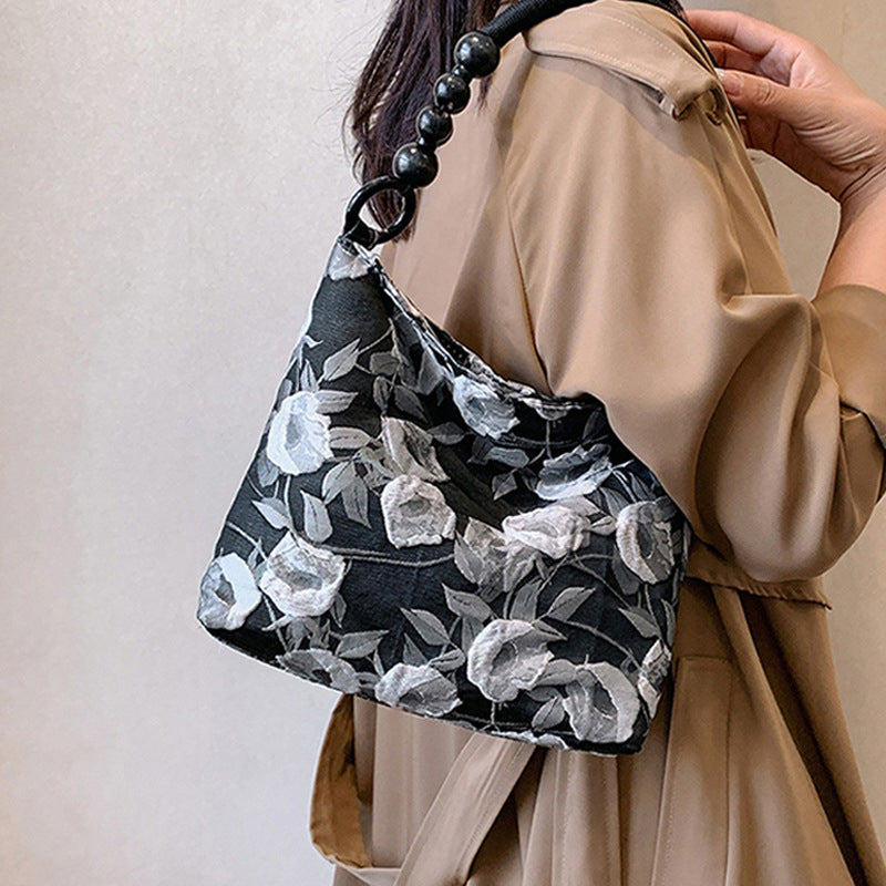 Bolsos vintage elegantes con flores y cuentas plegables