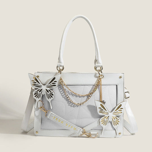 Bolsos elegantes con cadenas de mariposas y letras