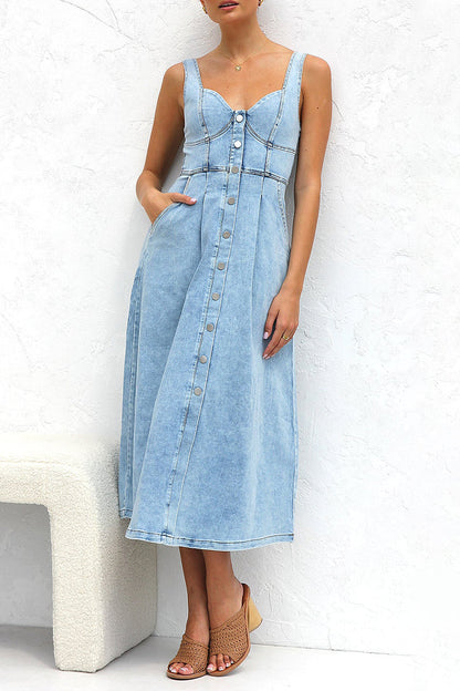 Elegante vestido vaquero holgado sin mangas con cuello en V y hebilla de bolsillo antiguo de color sólido