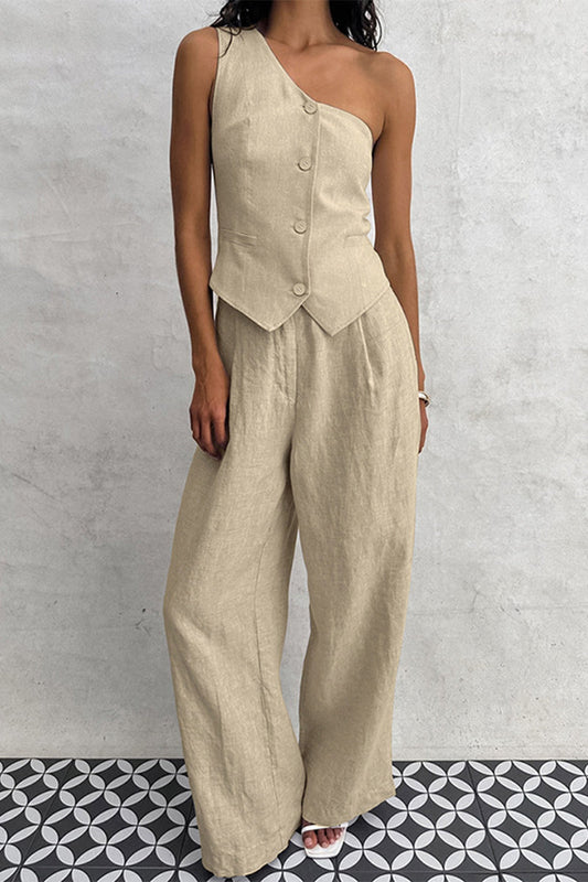 Conjunto informal sencillo de dos piezas con bolsillos, botones y cuello oblicuo, sin mangas