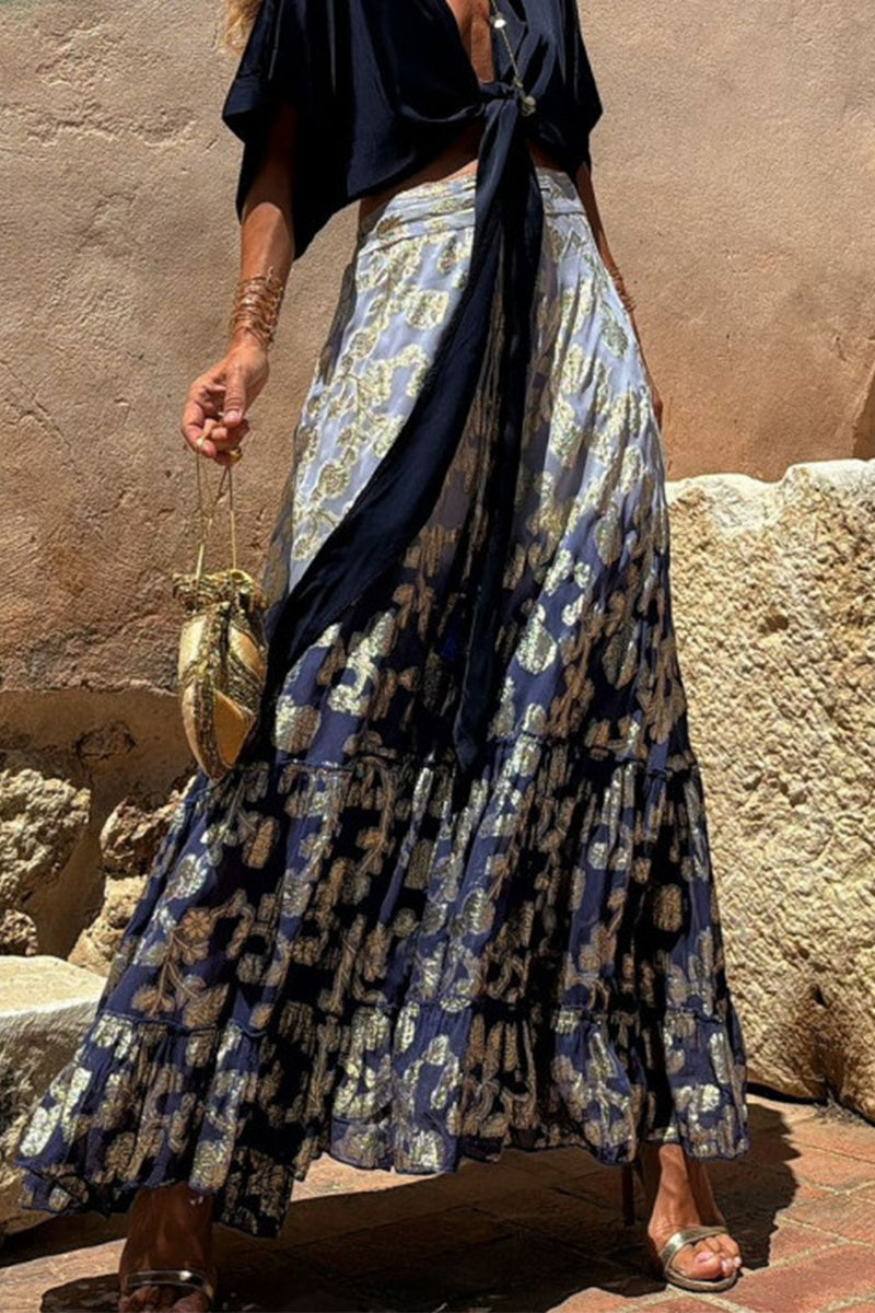 Elegante pantalón tipo A con estampado completo, holgado, de cintura alta, con volantes y contraste de flores