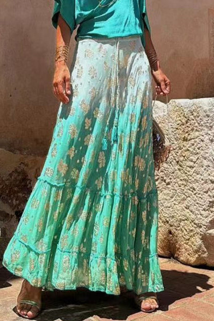 Elegante pantalón tipo A con estampado completo, holgado, de cintura alta, con volantes y contraste de flores