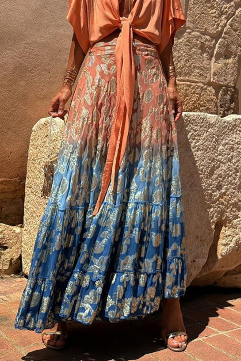 Elegante pantalón tipo A con estampado completo, holgado, de cintura alta, con volantes y contraste de flores