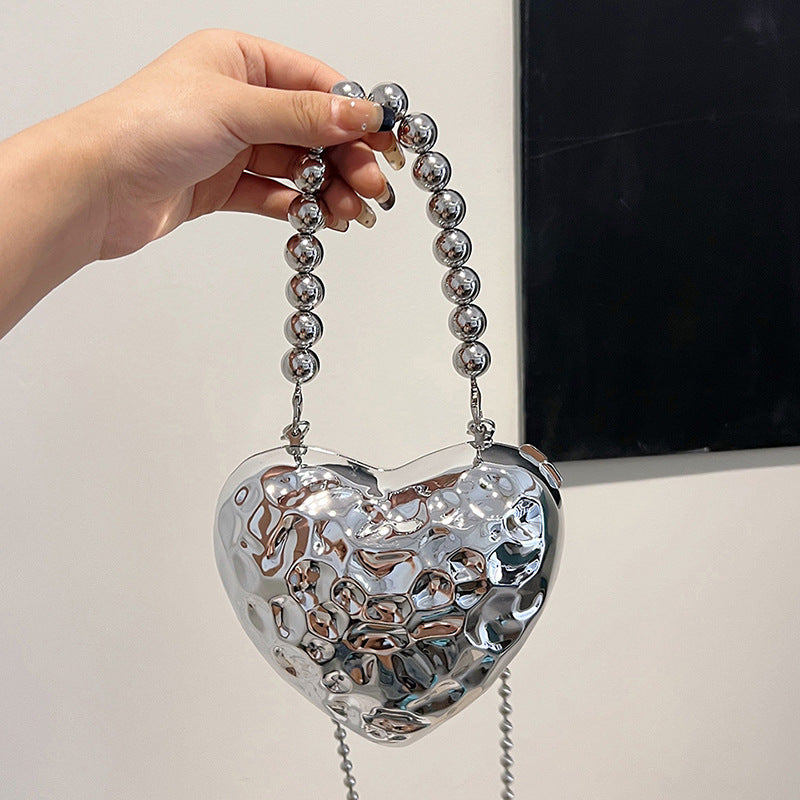 Bolsos casuales con cadenas sólidas en forma de corazón
