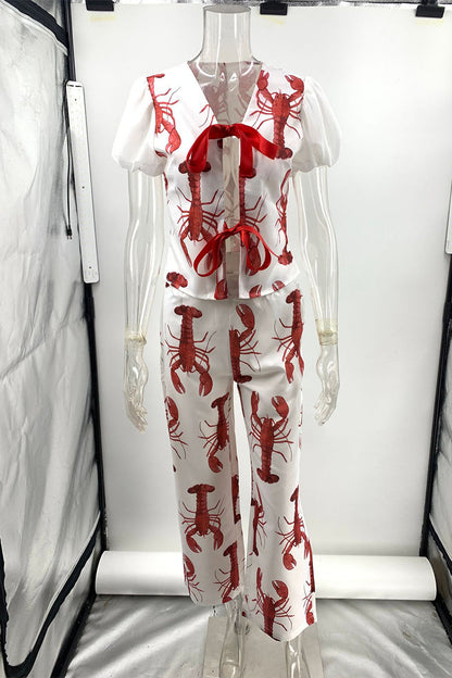 Conjunto de dos piezas con estampado animal, cuello en V, manga corta y lazo