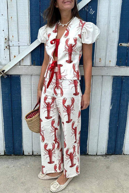 Conjunto de dos piezas con estampado animal, cuello en V, manga corta y lazo