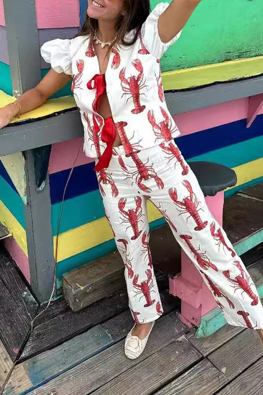 Conjunto de dos piezas con estampado animal, cuello en V, manga corta y lazo