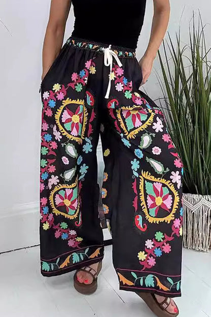 Pantalones casuales con estampado de grafiti callejero, flores, bolsillos, cintura alta, pierna ancha y estampado completo (3 colores)