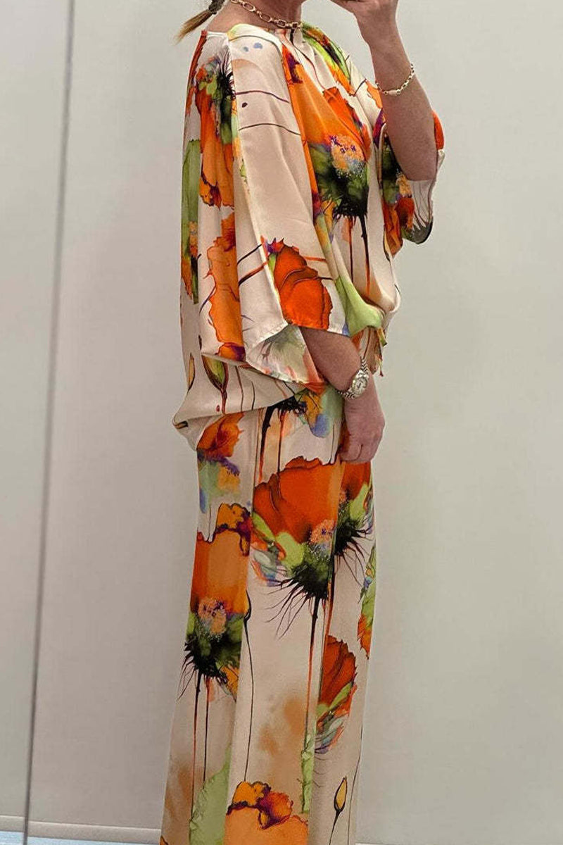 Conjunto informal de dos piezas, tres cuartos y cuello redondo con estampado floral urbano